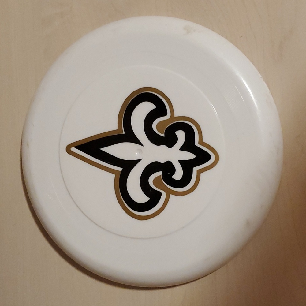 White Frisbee featuring a Black and Gold Fleur-de-Lis